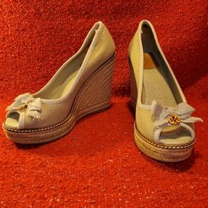 Tory Burch tan canvas espadrille wedges.